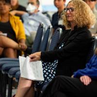 Audience listening to presentation.